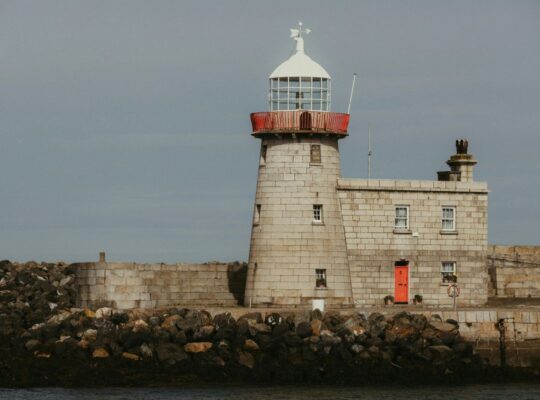 a lighthouse at the harbour